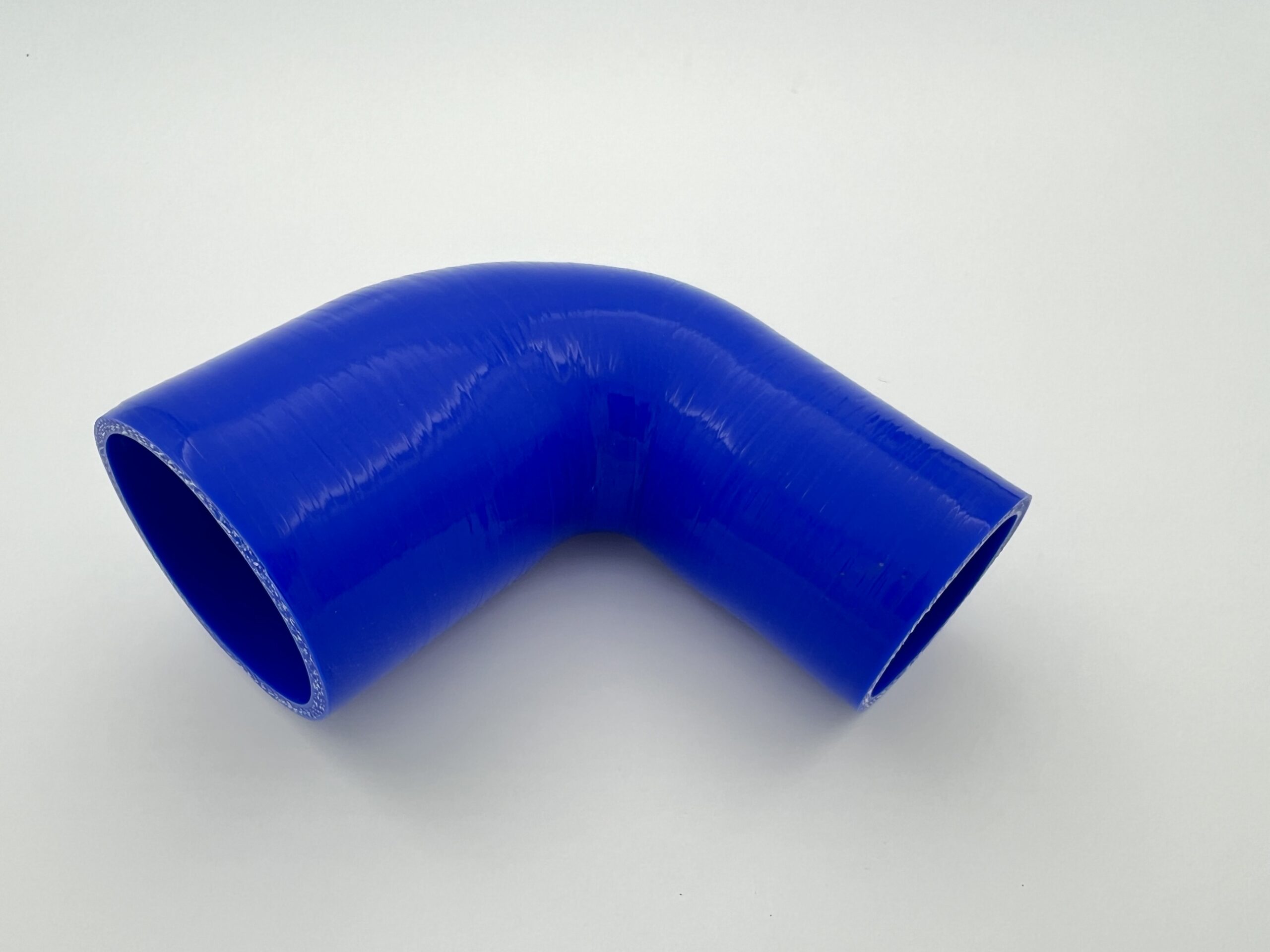 US-7663125-S - Ø76/63 mm - 125x125 mm - Silikonsko crevo pod 90° reducirano